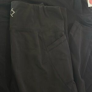 Size small black skinny leggings with pockets